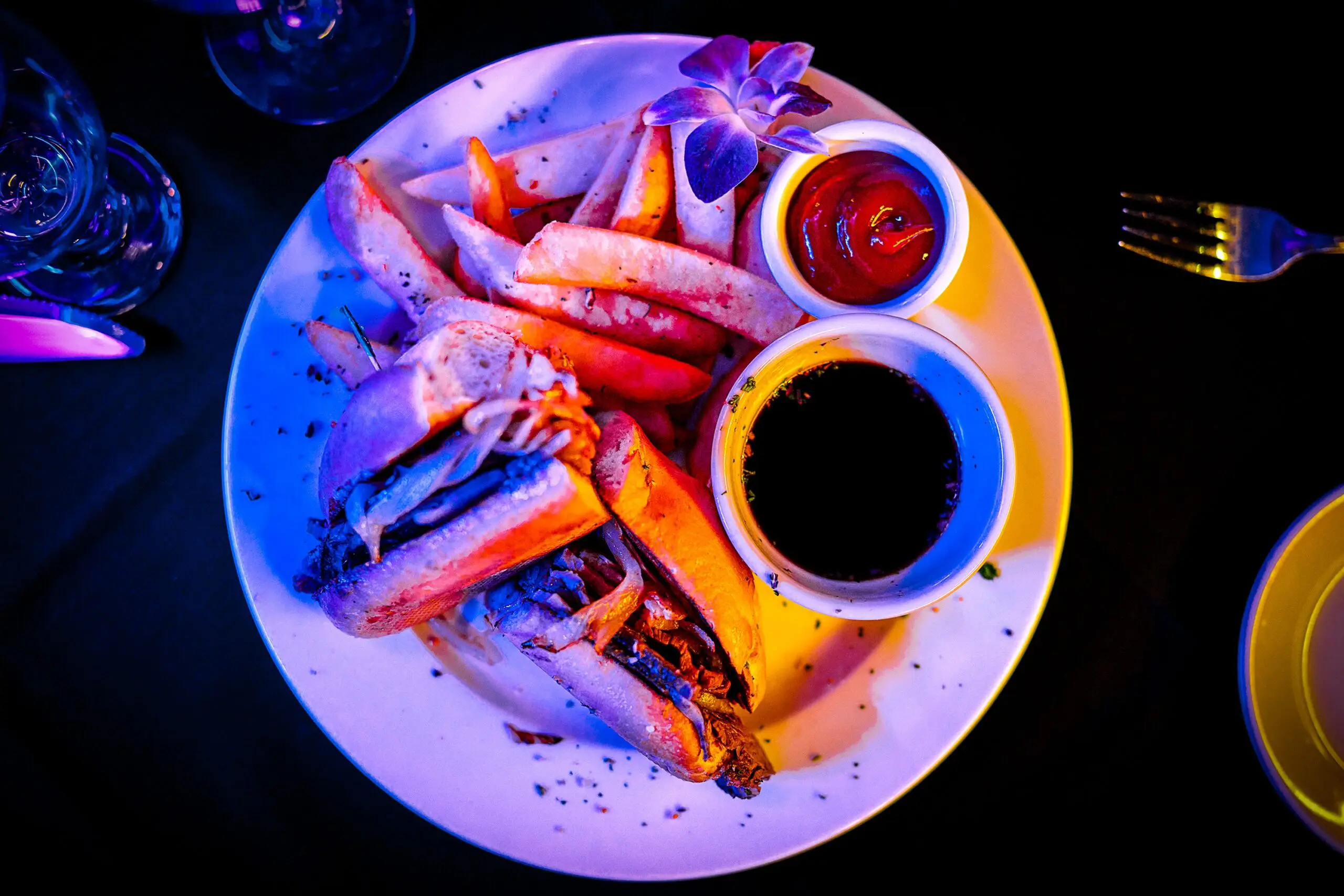 Vibrant meal with colorful lighting
