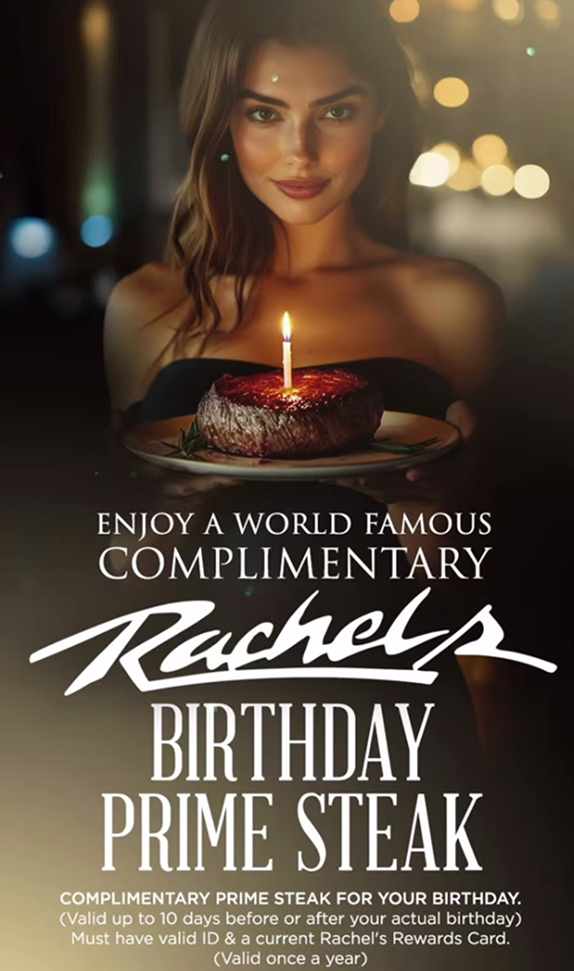 Woman holding cake with candle
