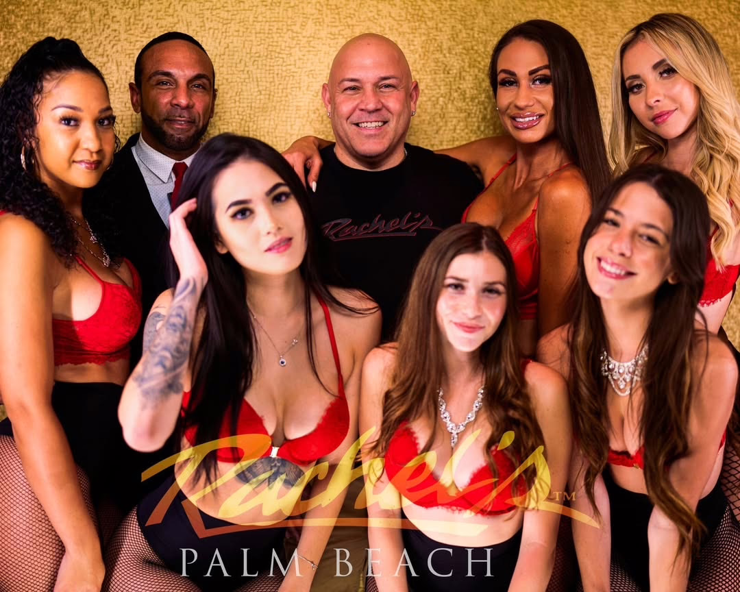Group posing in red outfits