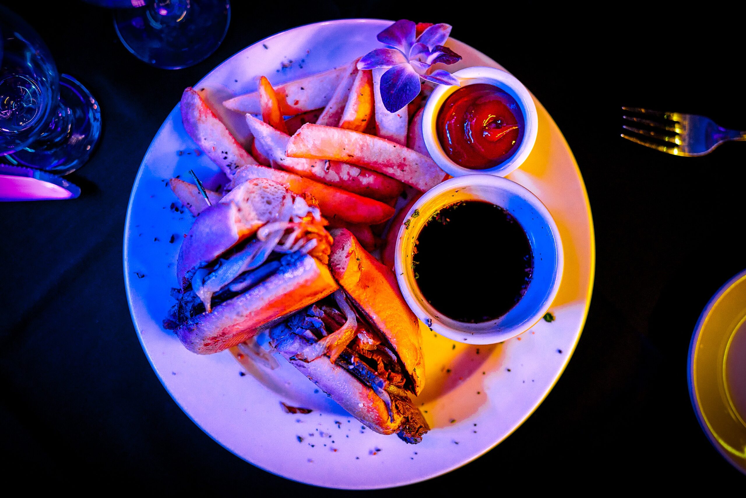 Vibrant meal with colorful lighting